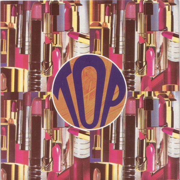 Top - She's Got All The World